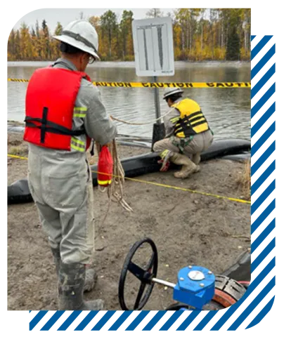 Example of personnel working as a team using life jackets and utilizing fall restraints.