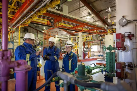 An instructor teaching students in a facility