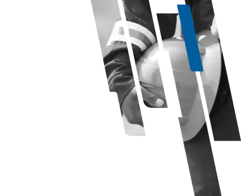 A worker holding a hard hat